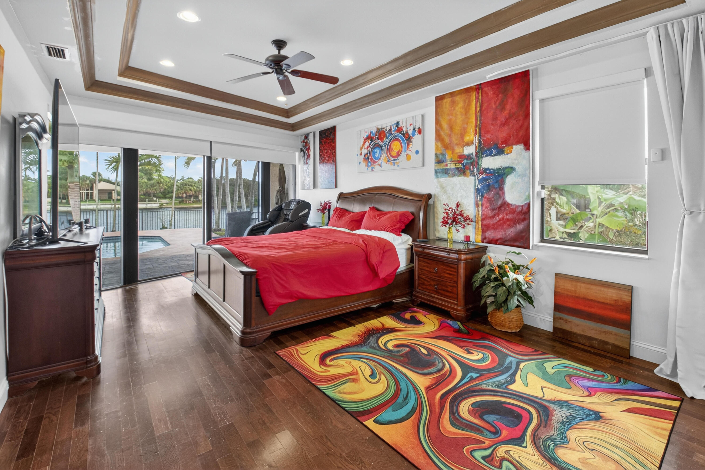 1940 Southwest 7th Place Boca Raton, FL 33486 - Photo 15 of 49 a bedroom with a bed and wooden floor