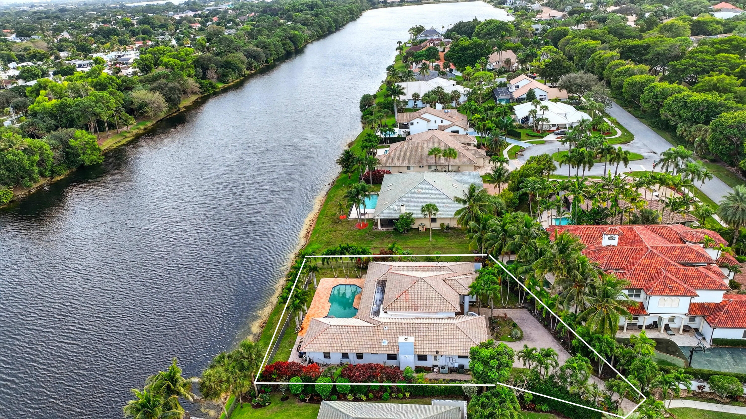 1940 Southwest 7th Place Boca Raton, FL 33486 - Photo 39 of 49 an aerial view of a house with a garden and plants