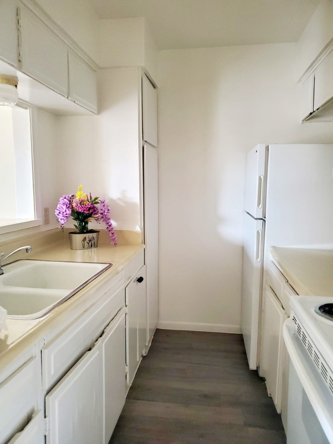 3003 Broadway Street Houston, TX 77017 - Photo 1 of 6 a kitchen with a sink and a refrigerator