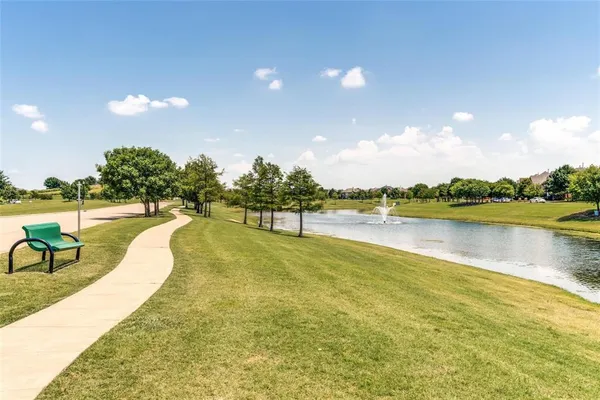 a view of a swimming pool and lake