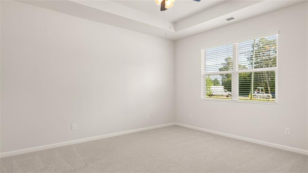 216 Cattle Drive Perry, GA 31069 - Photo 16 of 32 an empty room with a window