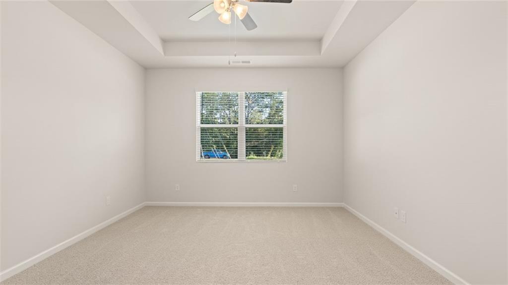 216 Cattle Drive Perry, GA 31069 - Photo 17 of 32 an empty room with a window