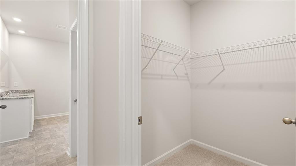 216 Cattle Drive Perry, GA 31069 - Photo 19 of 32 a view of a room with racks on the wall