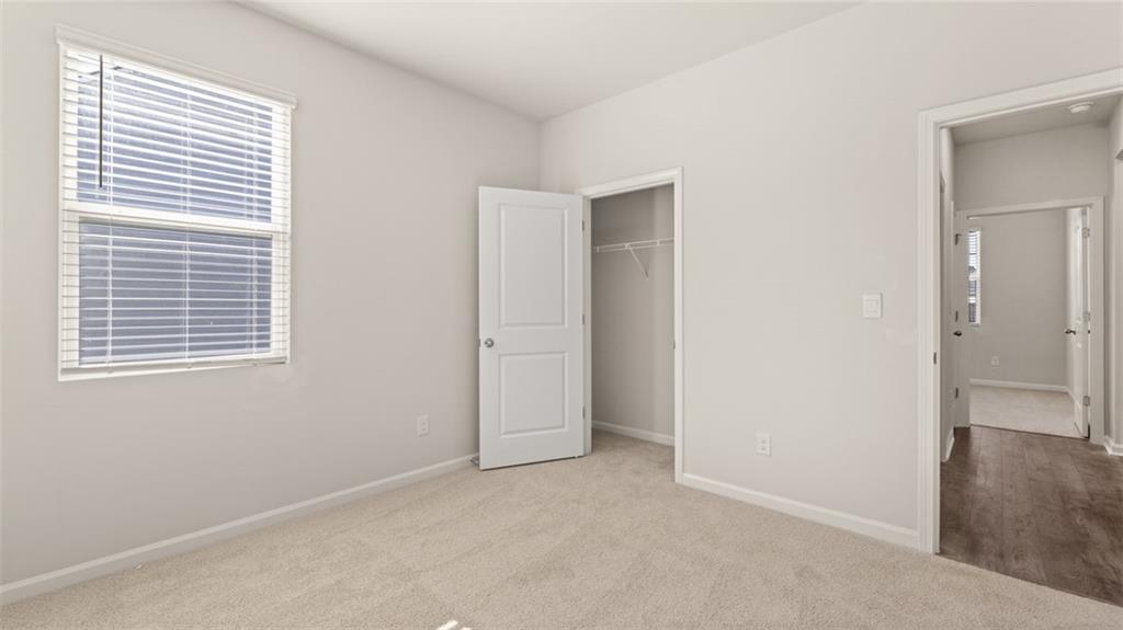 216 Cattle Drive Perry, GA 31069 - Photo 27 of 32 a view of an empty room with a window