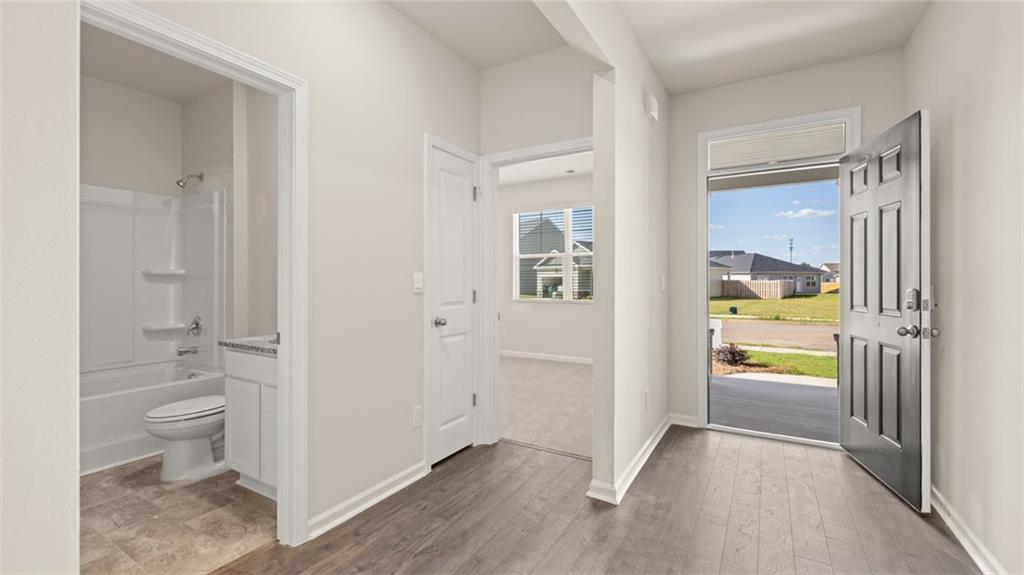 216 Cattle Drive Perry, GA 31069 - Photo 3 of 32 a view of an empty room and a gallery