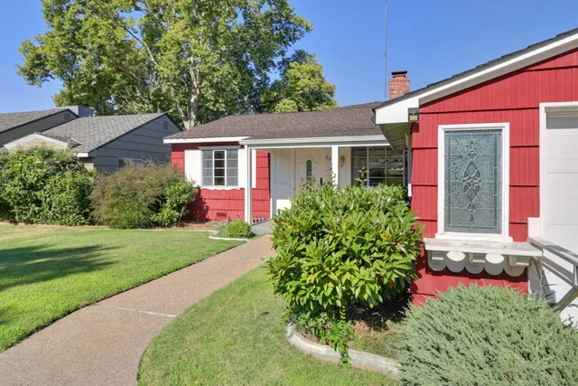 front view of a house with a yard