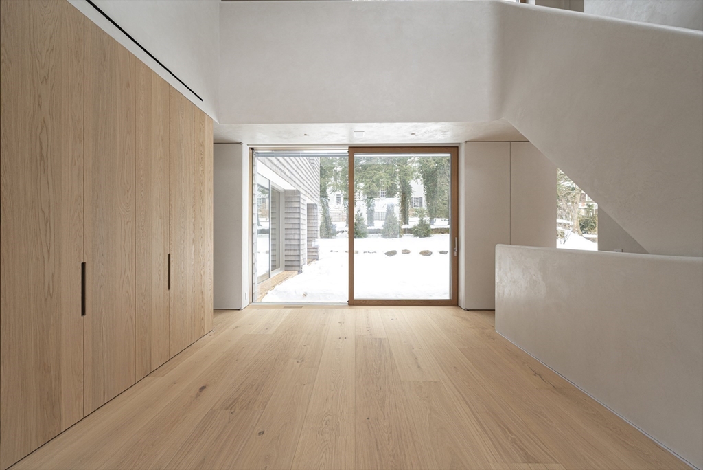 45 White Oak Road Wellesley, MA 02481 - Photo 28 of 38 a view of a room with wooden floor and white walls
