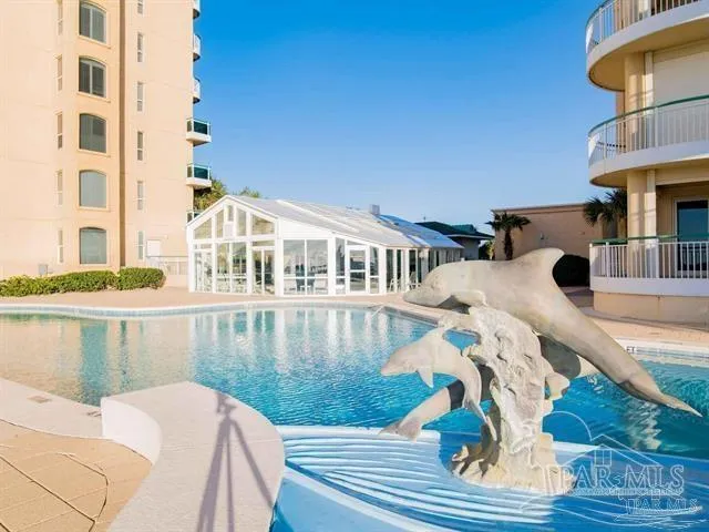 a view of balcony with two chairs and wooden floor