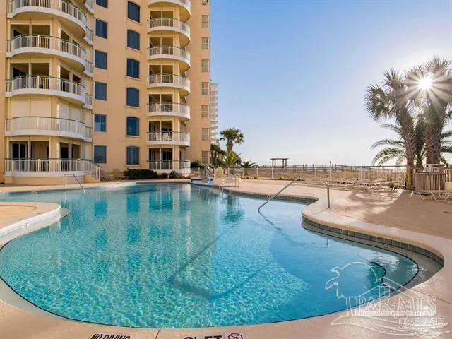 a view of a swimming pool with an outdoor space
