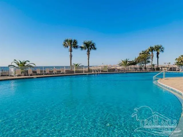 a view of a water fountain and an ocean