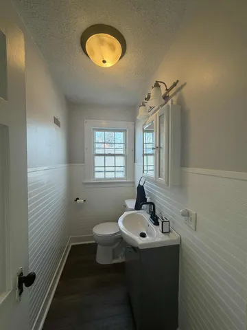 a bathroom with a sink and mirror