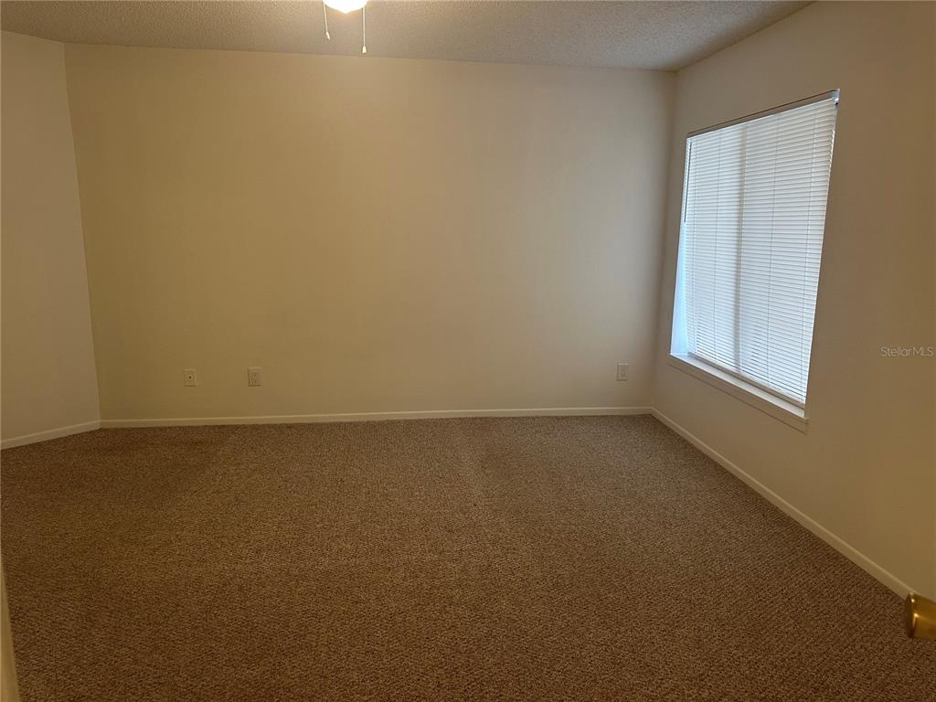 1550 South Belcher Road, Unit 412 Clearwater, FL 33764 - Photo 16 of 40 an empty room with a window