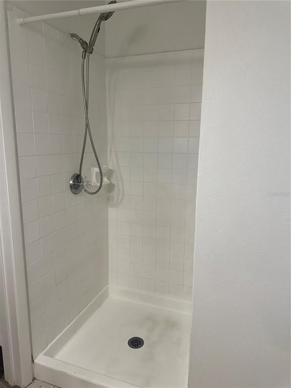 1550 South Belcher Road, Unit 412 Clearwater, FL 33764 - Photo 19 of 40 a bathroom with a shower