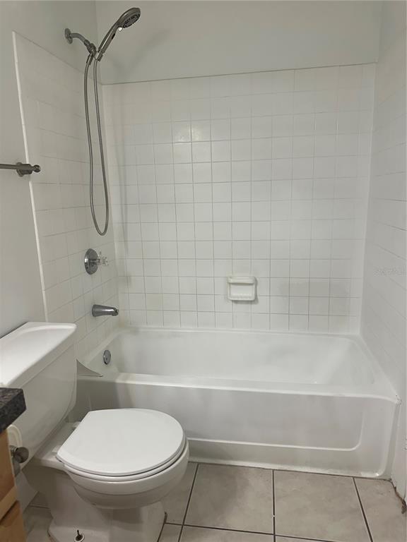1550 South Belcher Road, Unit 412 Clearwater, FL 33764 - Photo 25 of 40 a bathroom with a toilet and a shower