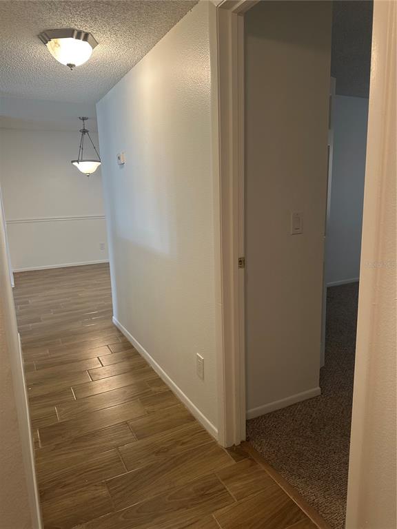 1550 South Belcher Road, Unit 412 Clearwater, FL 33764 - Photo 26 of 40 an empty room with wooden floor