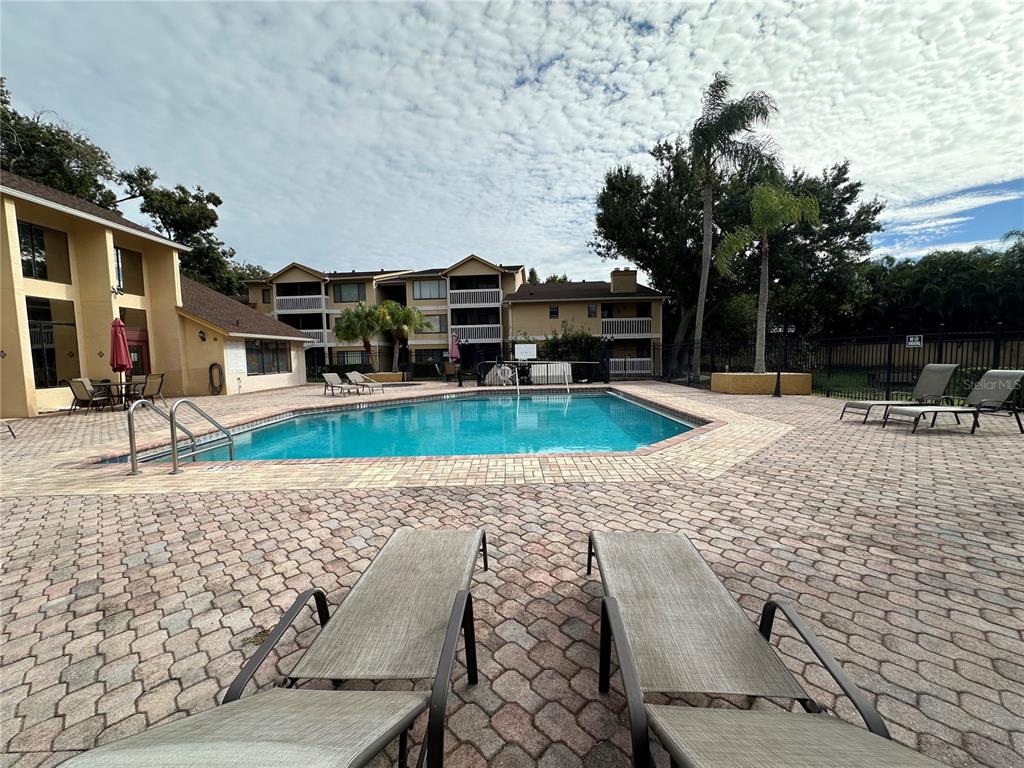 1550 South Belcher Road, Unit 412 Clearwater, FL 33764 - Photo 33 of 40 a view of a house with a yard