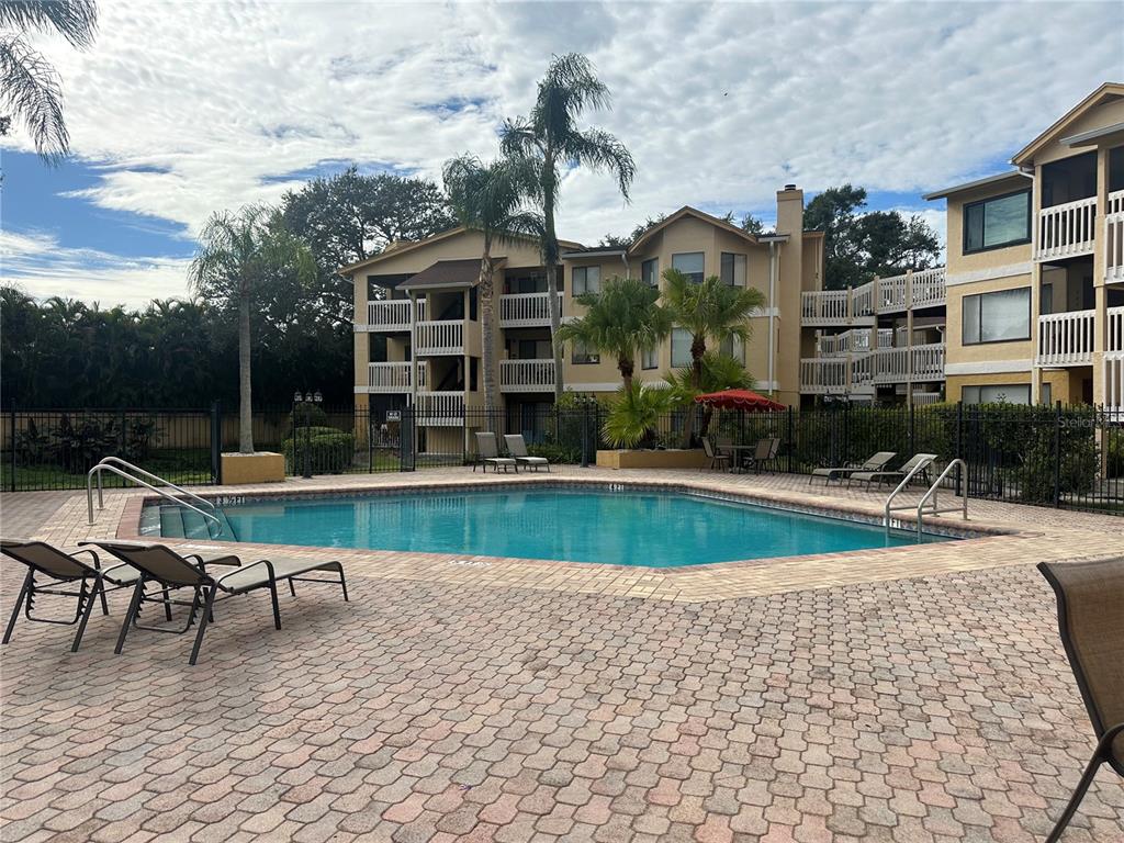 1550 South Belcher Road, Unit 412 Clearwater, FL 33764 - Photo 36 of 40 a view of a house with a swimming pool