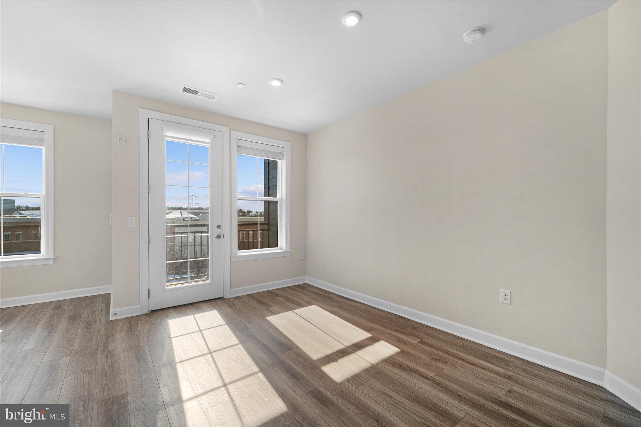3927 Fair Ridge Drive, Unit 409 Fairfax, VA 22033 - Photo 13 of 37 a view of an empty room with a window