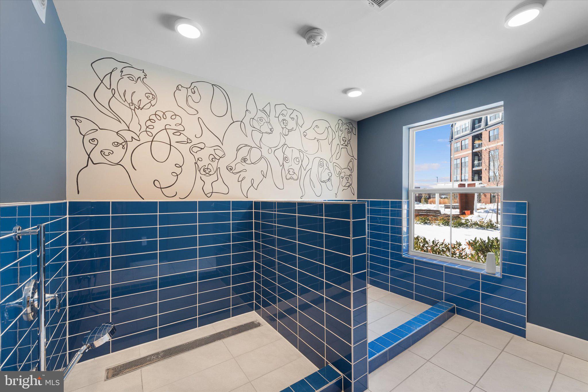 3927 Fair Ridge Drive, Unit 409 Fairfax, VA 22033 - Photo 29 of 37 a bathroom with a shower