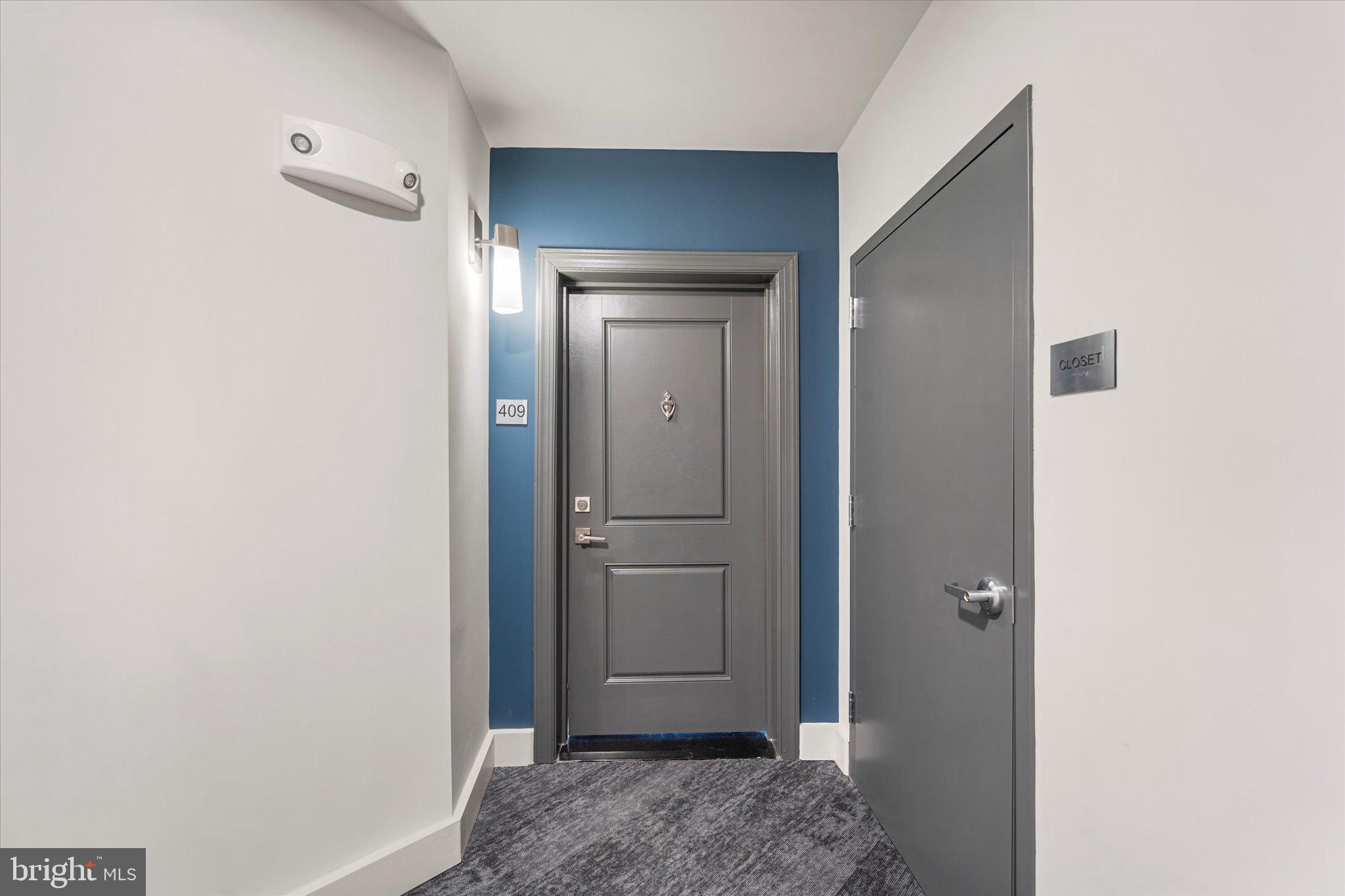 3927 Fair Ridge Drive, Unit 409 Fairfax, VA 22033 - Photo 8 of 37 a view of bathroom with a sink and mirror