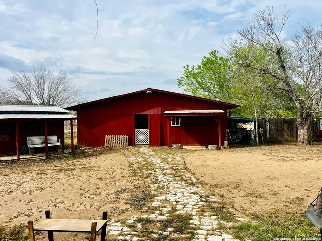 a house view with a outdoor space