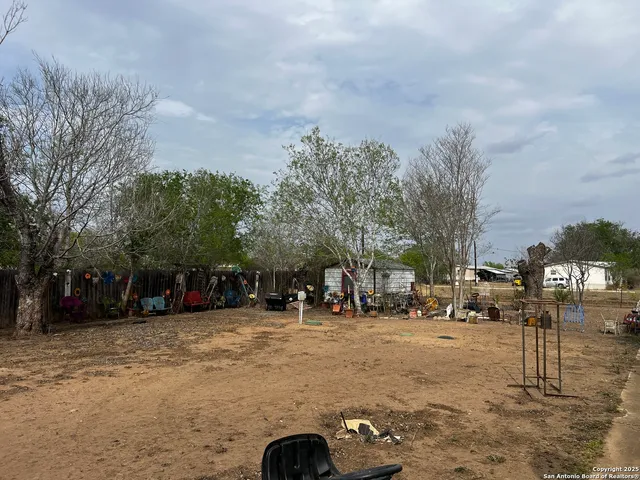 a view of a park with lots of trees