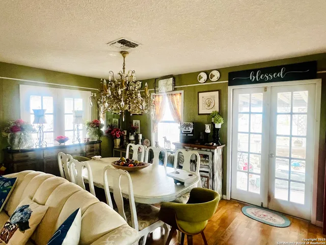 a view of a livingroom with furniture and window