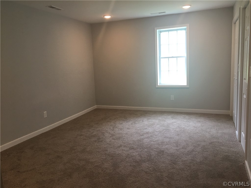 12900 Spring Run Road Midlothian, VA 23112 - Photo 11 of 21 an empty room with a window