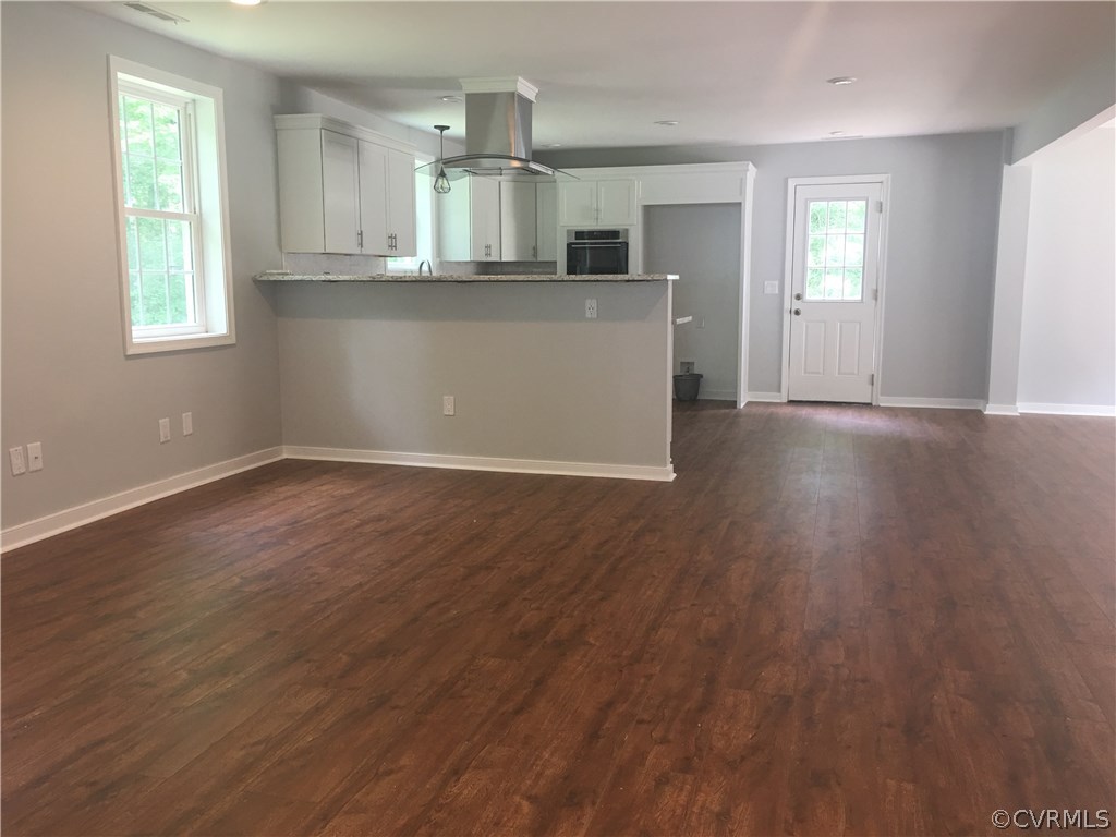 12900 Spring Run Road Midlothian, VA 23112 - Photo 19 of 21 an empty room with wooden floor and windows