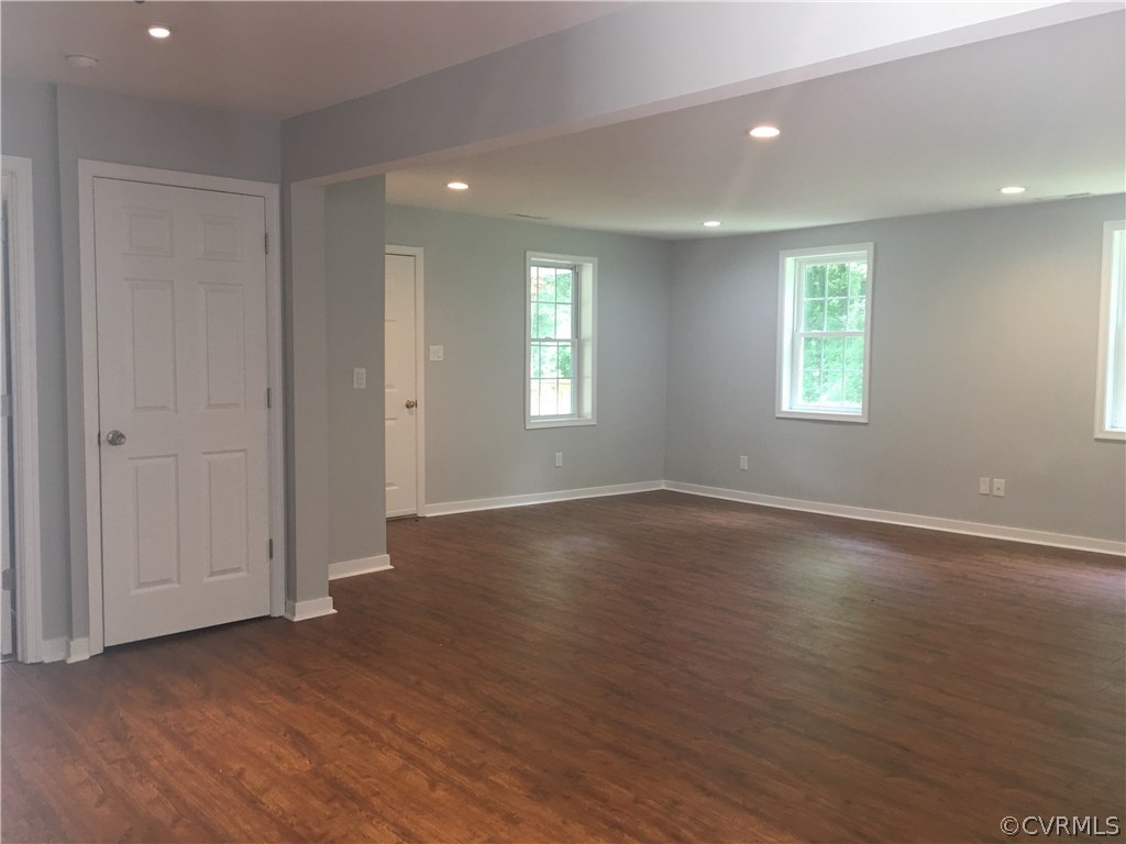 12900 Spring Run Road Midlothian, VA 23112 - Photo 2 of 21 an empty room with wooden floor and window