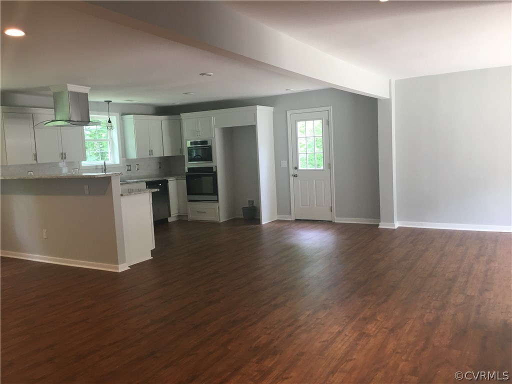 12900 Spring Run Road Midlothian, VA 23112 - Photo 21 of 21 a view of a kitchen with wooden floor and a window