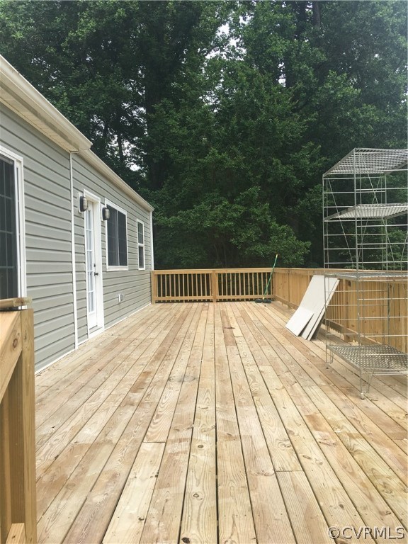 12900 Spring Run Road Midlothian, VA 23112 - Photo 5 of 21 a view of balcony with wooden floor and fence
