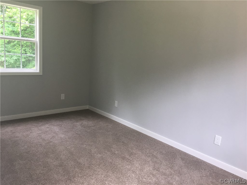 12900 Spring Run Road Midlothian, VA 23112 - Photo 10 of 21 an empty room with a window