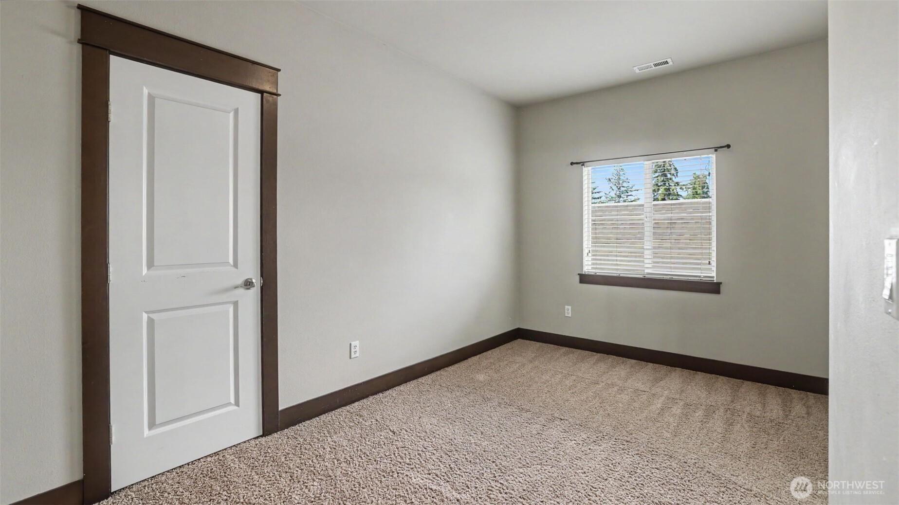 1357 Elma Place Northeast Renton, WA 98059 - Photo 22 of 40 a view of an empty room with a window