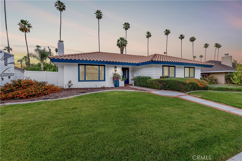 4967 Chapala Drive Riverside, CA 92507 - Photo 2 of 34 a view of a house with a backyard and a garden
