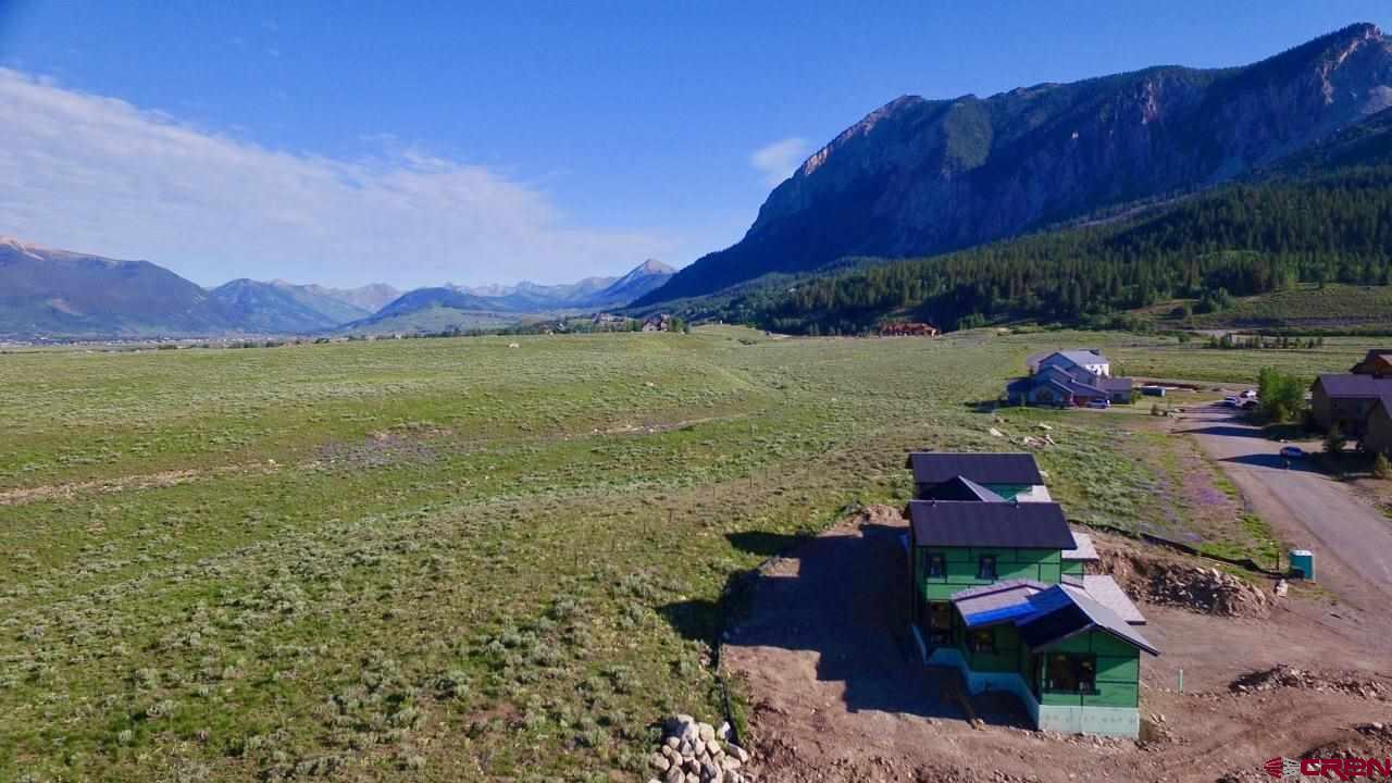 138 Elk Valley Road, Unit B Crested Butte, CO 81224 - Photo 6 of 19 a view of lake and mountain