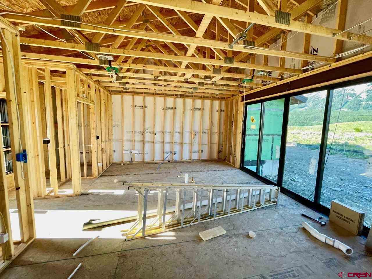 138 Elk Valley Road, Unit B Crested Butte, CO 81224 - Photo 10 of 19 a view of an empty room with a balcony