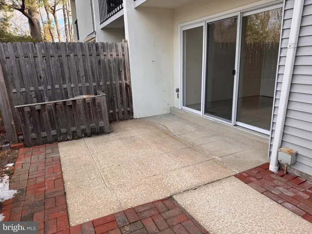 a view of outdoor space with wooden floor