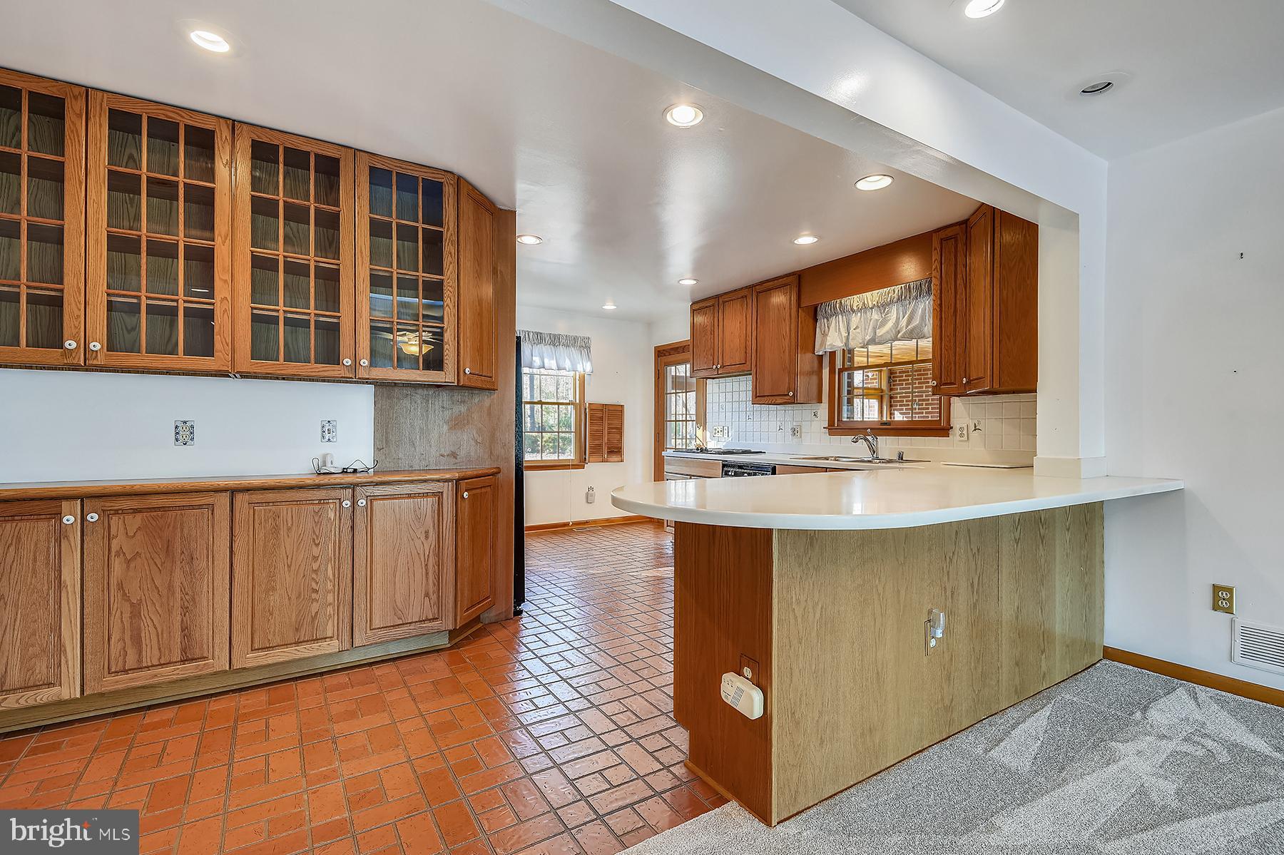 3434 Merrimac Road Davidsonville, MD 21035 - Photo 22 of 63 Kitchen has wood cabinetry and a breakfast bar