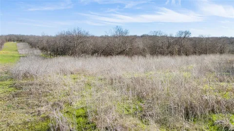 a view of a lake from a yard