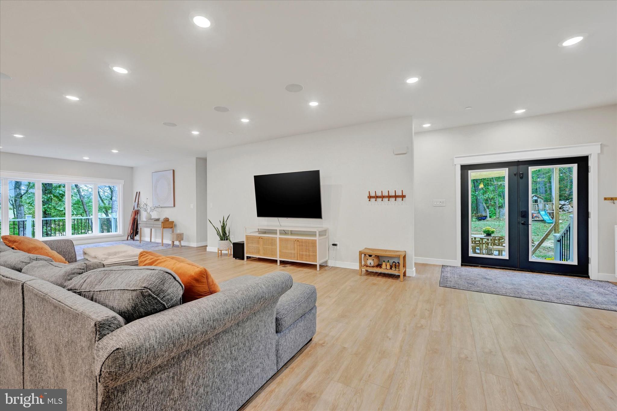 5437 Glen Arm Road Glen Arm, MD 21057 - Photo 12 of 45 a living room with furniture and a flat screen tv