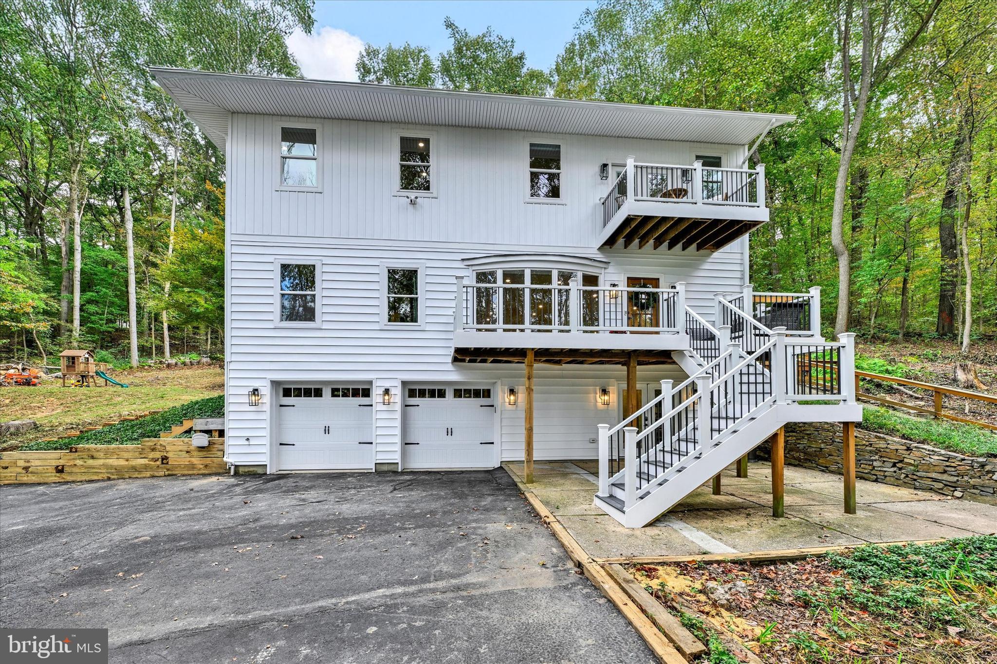 5437 Glen Arm Road Glen Arm, MD 21057 - Photo 3 of 45 front view of a house with a wooden deck