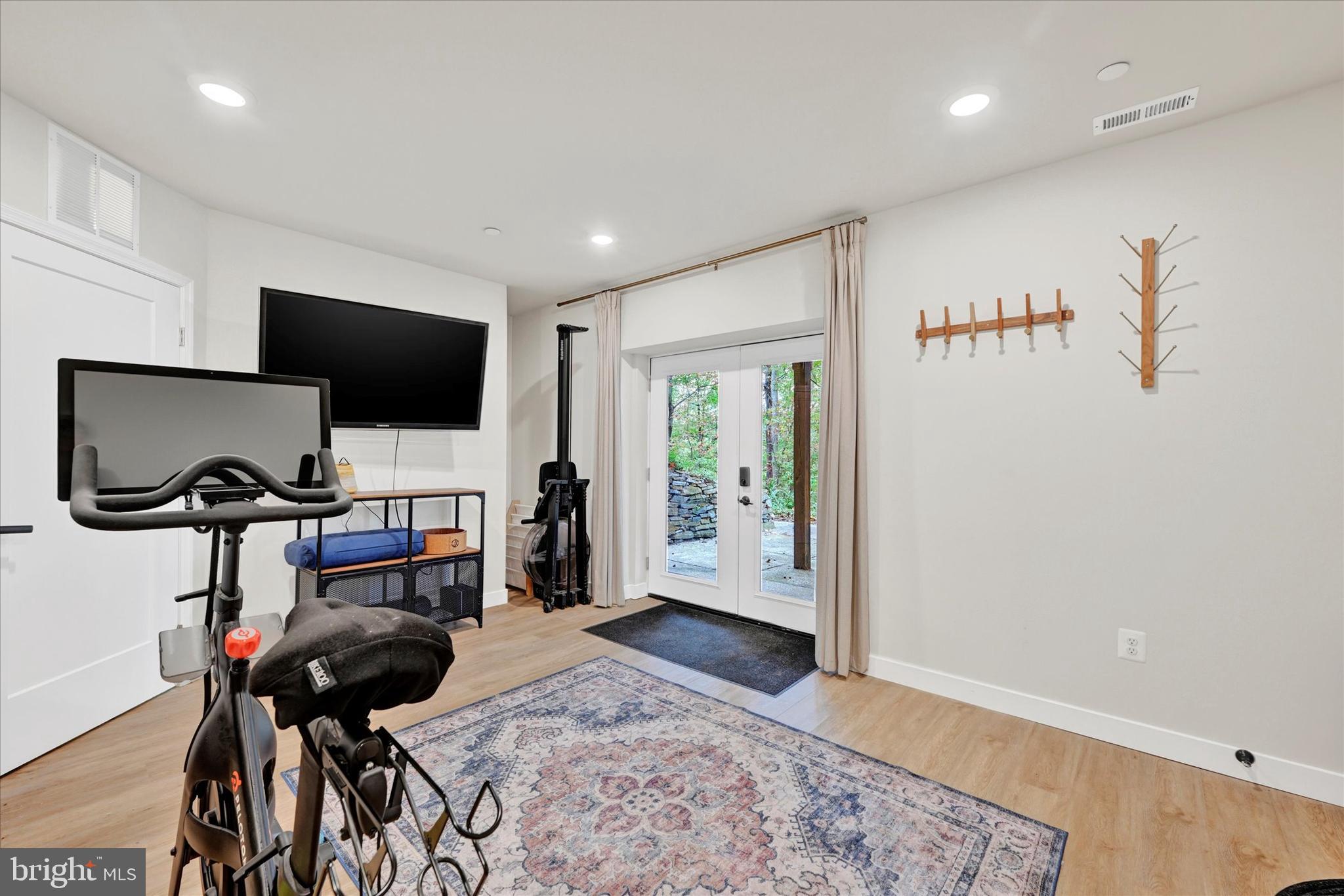 5437 Glen Arm Road Glen Arm, MD 21057 - Photo 40 of 45 a view of a livingroom with workspace and a flat screen tv