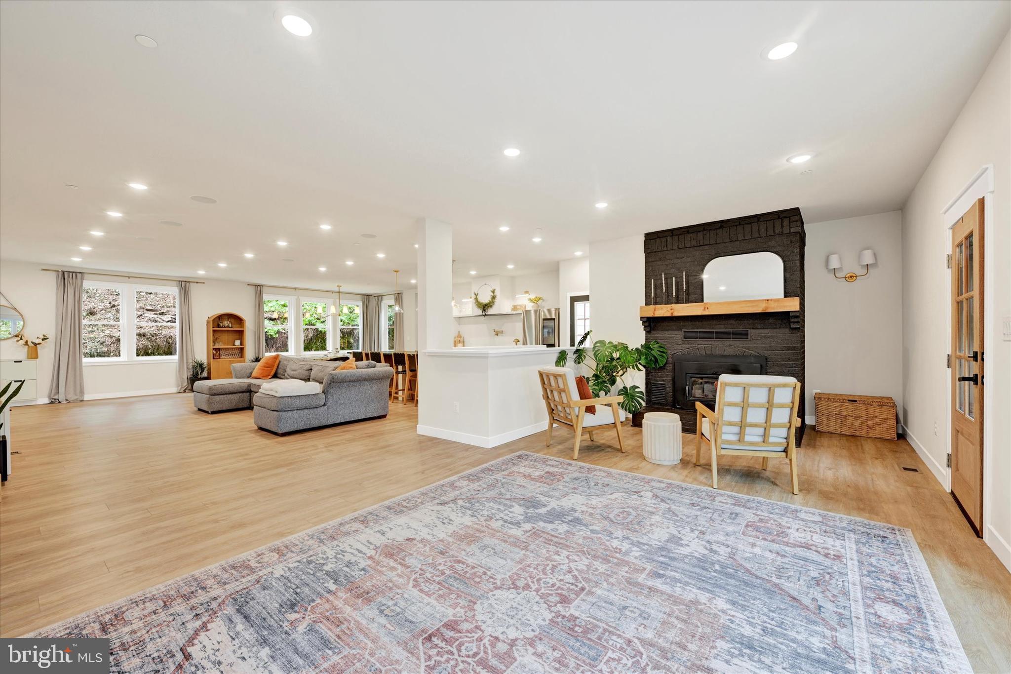 5437 Glen Arm Road Glen Arm, MD 21057 - Photo 6 of 45 a living room with furniture and a fireplace