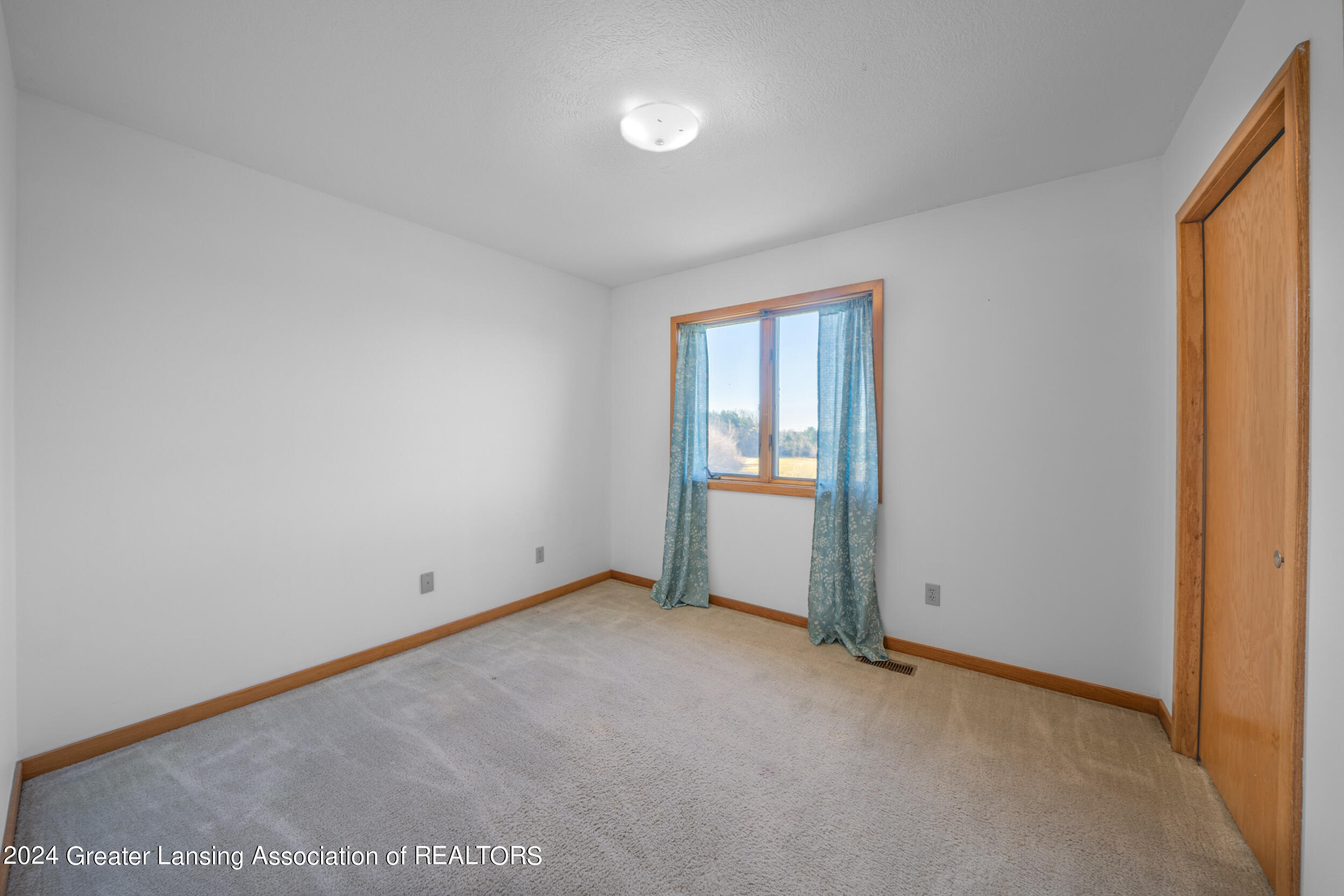 1261 Gidner Road Charlotte, MI 48813 - Photo 34 of 45 Bedroom 2