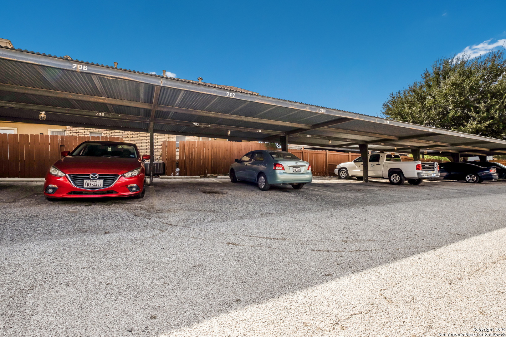 923 Vance Jackson Road, Unit 708 San Antonio, TX 78201 - Photo 15 of 18 a car parked in parking