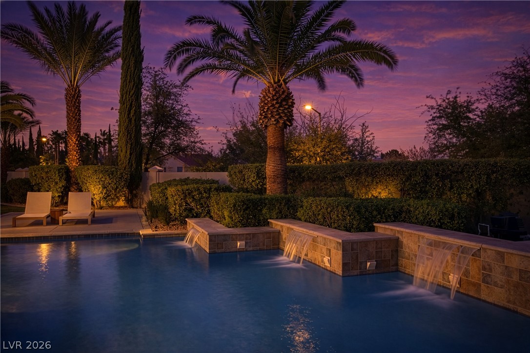 8800 Lusso Las Vegas, NV 89134 - Photo 10 of 85 View of pool featuring a fenced backyard and patio surround