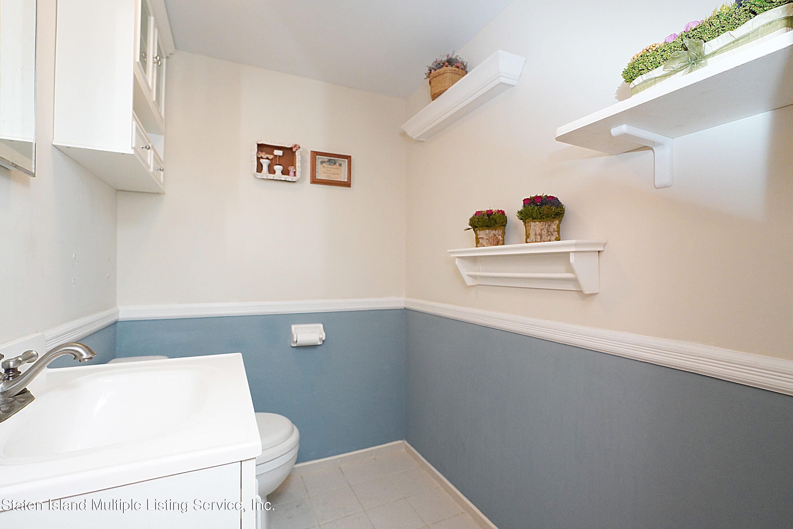 341 Beach Road Staten Island, NY 10312 - Photo 19 of 28 Bathroom 2 (half bath)