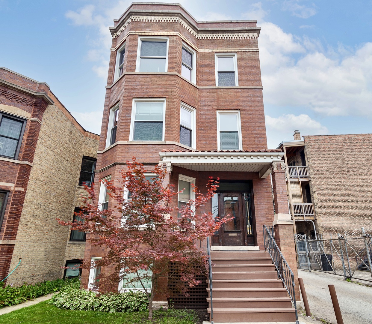 a front view of a multi story residential apartment building
