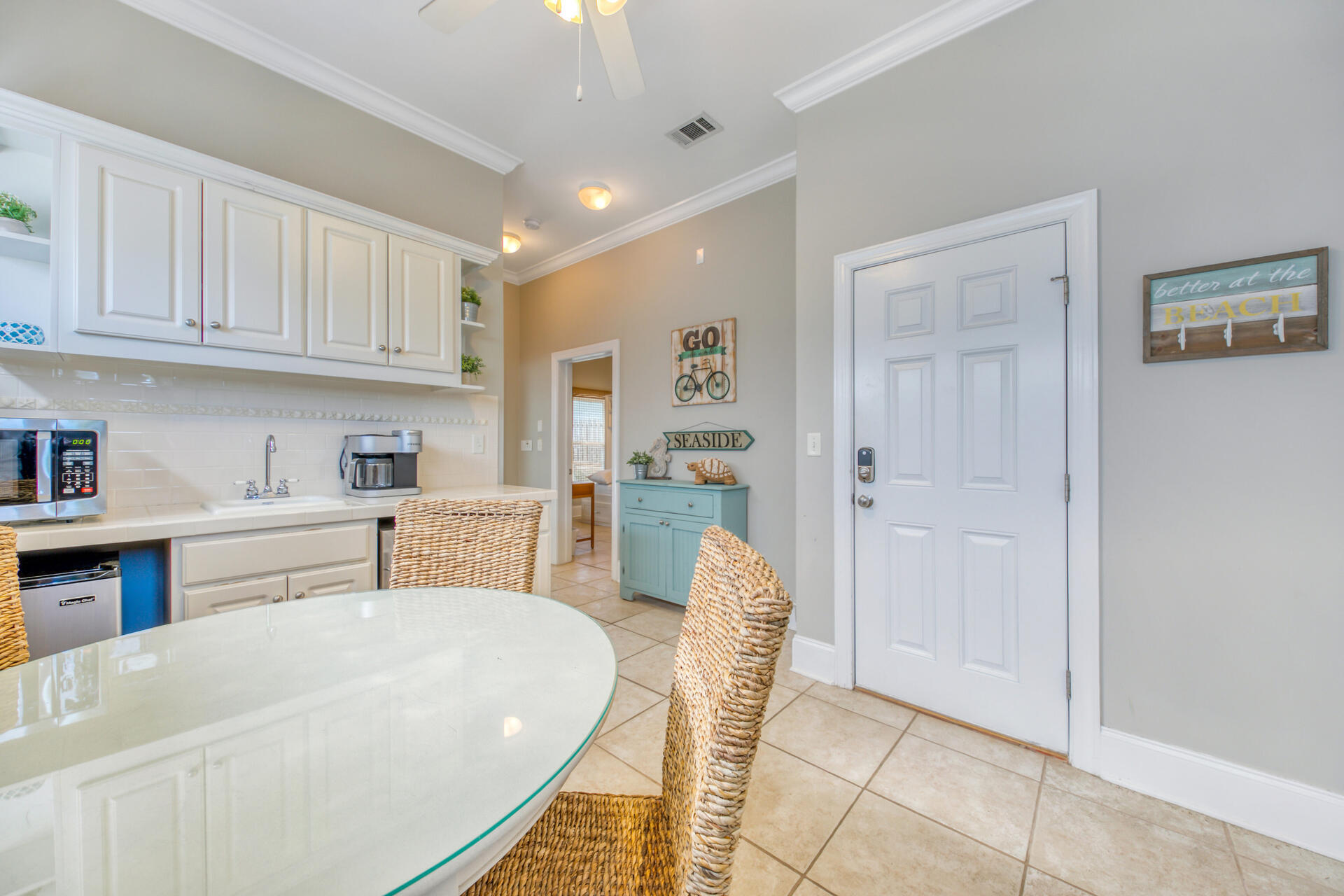 28 Sandcastle Court Santa Rosa Beach, FL 32459 - Photo 22 of 78 a large white kitchen with cabinets